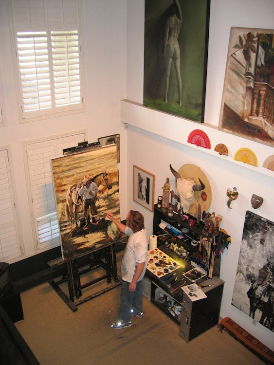 Working in my former Calgary loft studio on “Loyal Friends” 60X40” oil on canvas (commission) 2006 (the 2007 Calgary Stampede poster painting)